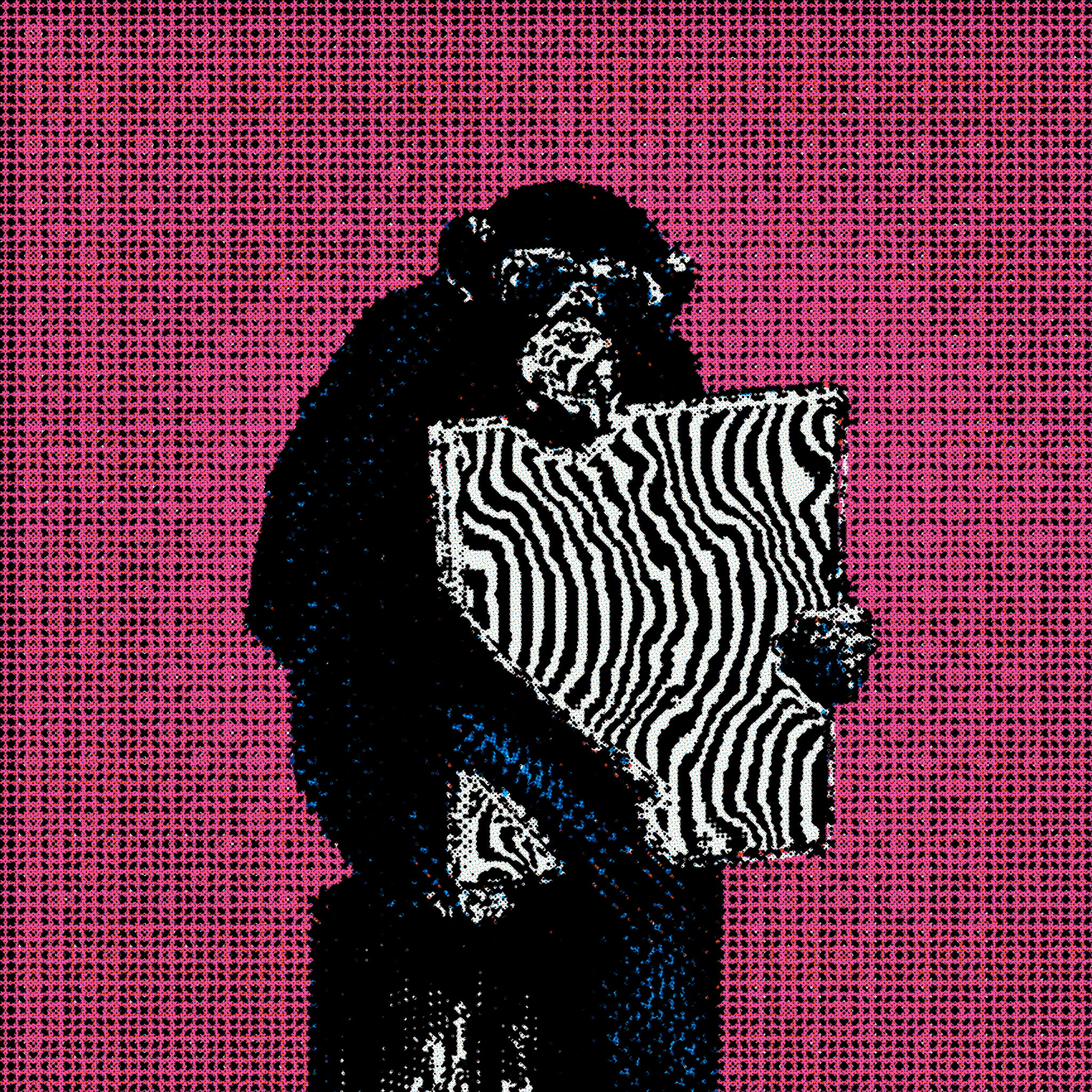 Culture Monke holding a patterned canvas